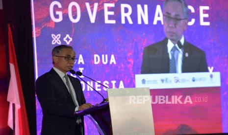 Ketua Otoritas Jasa Keuangan (OJK) Wimboh Santoso menyampaikan sambutan dalam G20/OECD Corporate Governance Forum di sela 3rd FMCBG-FCBD G20 di Nusa Dua, Bali, Kamis (14/7/2022). Forum tersebut membahas berbagai hal tentang tata kelola perusahaan. 