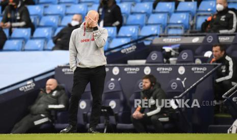  Manajer Manchester City Pep Guardiola saat pertandingan sepak bola Liga Utama Inggris antara Manchester City dan Manchester United di Manchester, Inggris, 07 Maret 2021.