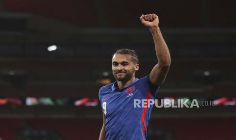 Dominic Calvert-Lewin dari Inggris merayakan setelah mencetak gol kedua timnya selama pertandingan sepak bola kualifikasi grup I Piala Dunia 2022 antara Inggris dan San Marino di stadion Wembley di London, Kamis 25 Maret 2021. 