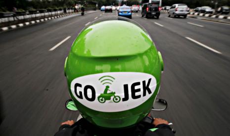 Tak Laporkan Akuisisi Loket, Gojek Kena Denda Rp3,3 Miliar (Foto: Reuters/Beawiharta)