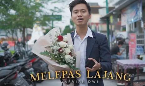 Lirik dan Download Lagu Melepas Lajang - Arvian Dwi ft Tri Suaka