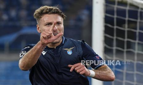  Ciro Immobile dari Lazio merayakan setelah mencetak gol ketiga timnya selama pertandingan sepak bola Grup F Liga Champions UEFA antara SS Lazio dan FC Zenit St.Petersburg di stadion Olimpico di Roma, Italia