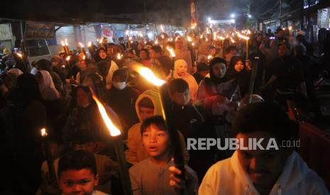 Pawai obor malam tahun baru Islam.