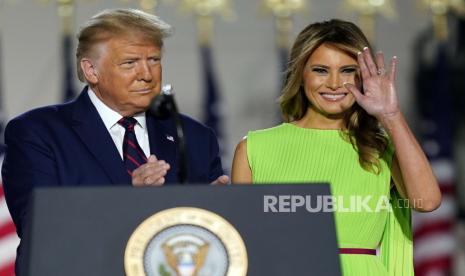 Presiden Donald Trump dan ibu negara Melania Trump.