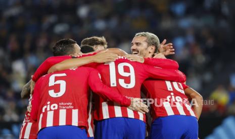 Penyerang Atletico Madrid Antoine Griezmann merayakan golnya ke gawang Celtic dalam pertandingan Liga Champions