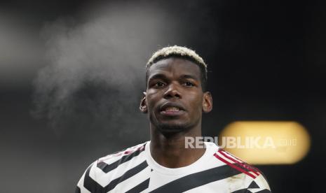  Paul Pogba merayakan gol setelah mencetak keunggulan 1-0 selama pertandingan sepak bola Liga Premier Inggris antara Burnley FC dan Manchester United di Burnley, Inggris, 12 Januari 2021.