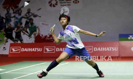  Putri Kusuma Wardani, pebulu tangkis Indonesia. 