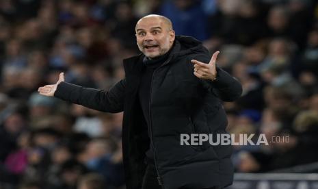 Reaksi Pep Guardiola pada pertandingan sepak bola Liga Premier Inggris antara Manchester City dan Tottenham Hotspur di Manchester, Inggris,  Jumat, (20/1/2023) dini hari.