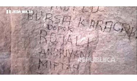 Sebuah aksi vandalisme berupa tulisan 