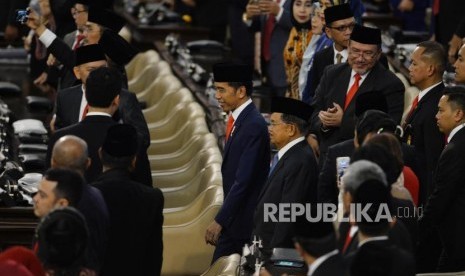 Presiden Joko Widodo saat acara pelantikan Presiden dan Wakil Presiden periode 2019-2024 di Gedung Nusantara, kompleks Parlemen, Senayan, Jakarta, Ahad (20/10).