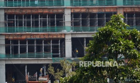 Pemkot Surabaya menggratiskan biaya mengurus Sertifikat Laik Fungsi (SLF) bangunan gedung.  Foto: Pertumbuhan Ekonomi Indoensia. Gedung bertingkat (ilustrasi).