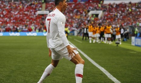   Selebrasi pesepak bola Portugal Cristiano Ronaldo usai mencetak gol tunggal pada pertandingan grup B Piala Dunia 2018, antara Portugal dan Maroko di Stadion Luzhniki, Moskow, Rabu (20/6).