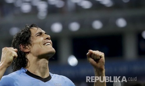  Menang 2-1 atas Portugal, Uruguay lolos ke babak 16 besar Piala Dunia 2018 pada pertandingan yang berlangsung di Stadion Fisht, Sochi, Rusia, Ahad (1/7) dini hari WIB.