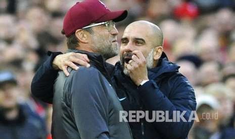 Manajer City Josep Guardiola (kanan) dan pelatih Liverpool Juergen Klopp.