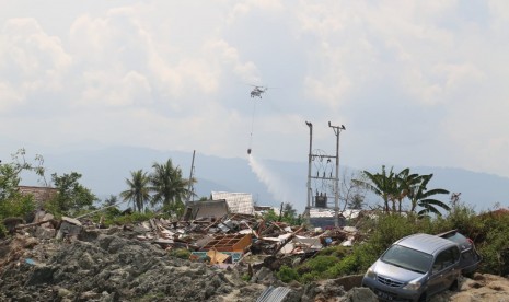 Water Bombing Dilakukan di Wilayah Terdampak Likuifaksi Pasca Tsunami