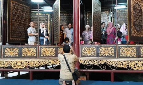 Halal tourism destination in South Sumatra, Bait Alquran or Alquran Akbar which made of two meters high and 1,5 meters wide wood sheet.