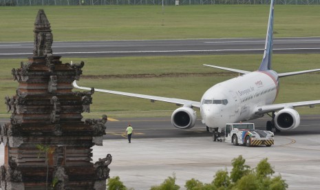 Pesawat udara berada di kawasan Bandara Internasional I Gusti Ngurah Rai, Bali, Jumat (8/3/2019). 