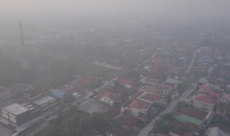 Kabut asap di Riau.