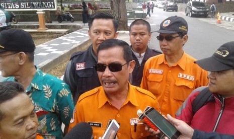 Kepala Pelaksana BPBD Kota Tasikmalaya Ucu Anwar saat diwawancara wartawan.