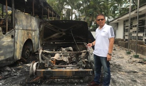 Wakil Ketua III Komite Olahraga Nasional Indonesia (KONI) DKI Jakarta, Didi O Affandi sekaligus pemilik mobil Rubicon yang terbakar di lapangan tembak senayan, Jakarta Pusat, Rabu (25/9).