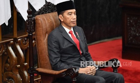 Presiden Joko Widodo menghadiri pelantikan anggota Dewan Perwakilan Rakyat (DPR) periode 2019-2024 di Ruang Rapat Paripurna, Kompleks Parlemen, Senayan, Jakarta, Selasa, (1/10/2019).