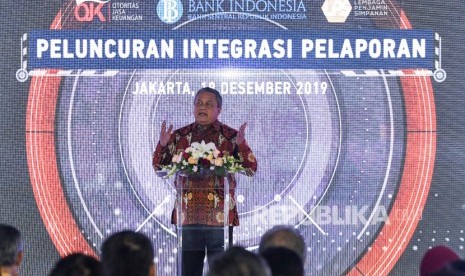 Gubernur Bank Indonesia Perry Warjiyo menyampaikan sambutan disela-sela Peluncuran Integrasi Pelaporan di Kantor Bank Indonesia, Jakarta, Kamis (19/12/2019).