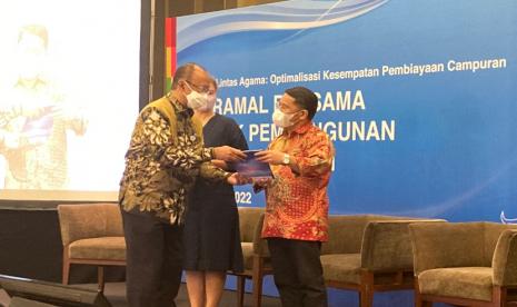 Direktur Jenderal Bimbingan Masyarakat Islam Kementerian Agama (Kemenag) Kamaruddin Amin dalam Forum Diskusi Lintas Agama: Optimalisasi Kesempatan Pembiayaan Campuran di Hotel Pullman, Jakarta, Selasa (12/4/2022).