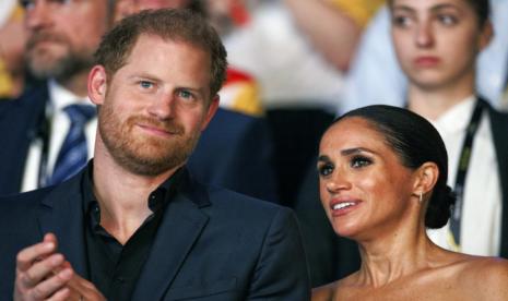 Pangeran Harry dan istrinya Meghan Markle. Keduanya dikecam setelah menghadiri pemutaran film Bob Marley: One Love di Jamaika, Selasa (23/1/2024).