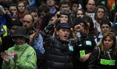 A demonstrator shouts slogans during the general strike in Pamplona, northern Spain on Thursday, May 30, 2013. 