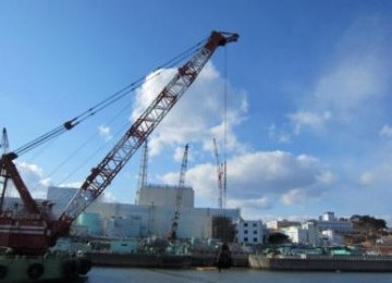 A floating crane removing obstacle is seen from east breakwater at the crippled Fukushima Daiichi nuclear plant in Fukushima prefecture (ilustration)