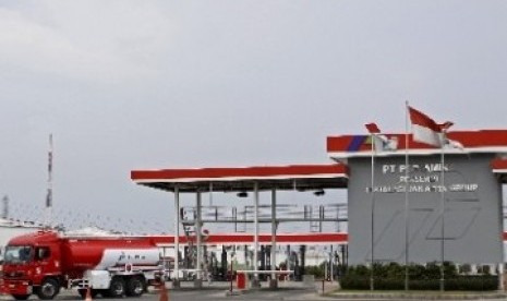 A fuel truck passes a service station at Plumpang, North Jakarta.   