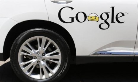 A Google self-driving vehicle is parked at the Computer History Museum after a presentation in Mountain View, California May 13, 2014.