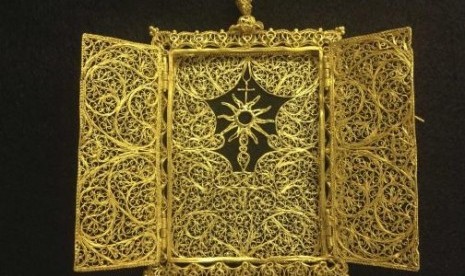 A high karat gold Pyx which was believed to have been hand crafted in the late 1600's - early 1700's for transporting a Eucharist (communion wafer) is seen in an undated handout photo.