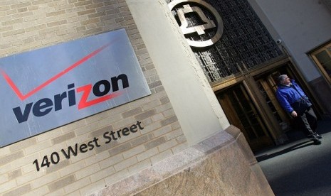 A man walks out the Verizon's new corporate headquarters.The Obama administration on Thursday, June 6, 2013, defended the government's need to collect telephone records of American citizens, calling such information 