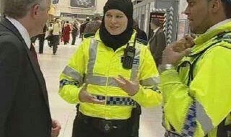 A poliwoman with headscarf in UK