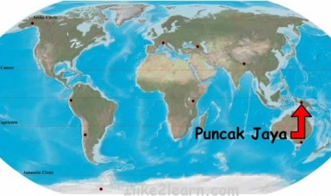 A red arrow shows the location of Puncak Jaya, where a commercial plane was shot several times on Sunday. (map) 