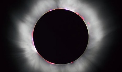 A total solar eclipse occurs where the moon completely covers the sun's disk. (illustration)