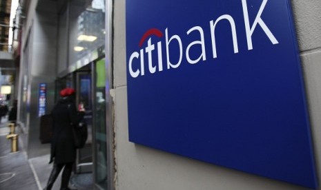 A woman walks into a Citibank branch in New York in this 2012 file photo. 