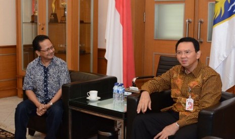 Ahok (kanan) dan Afrizal Sinaro