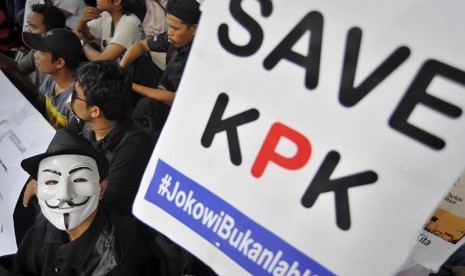  Aksi massa mendukung KPK memberantas tindak pidana korupsi. 