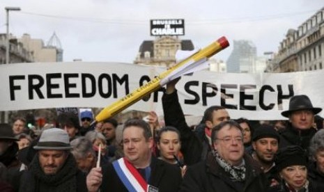 Aksi simpati terhadap korban penembakan Charlie Hebdo juga dilakukan di jalanan kota Brussel, Belgia, Ahad (11/1) waktu setempat.