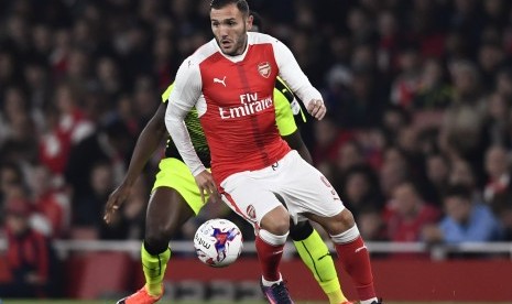 Aksi striker Arsenal, Lucas Perez pada laga Piala Liga lawan Reading di stadion Emirates, Rabu (26/10) dini hari WIB. Pascalaga Perez didiagnosis cedera otot ligamen kaki.