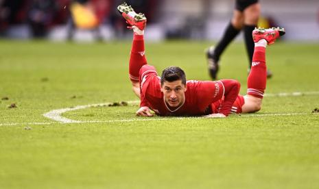 Aksi striker Bayern Muenchen, Robert Lewandowski pada laga Bundesliga lawan Rfb Stuttgart, di Allianz Arena, Sabtu (20/3). Muenchen menang 4-0.