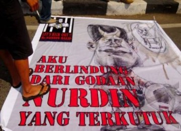 Aksi unjuk rasa tolak Nurdin Halid