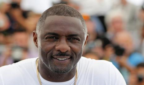 Aktor Idris Elba. Dia benci tersenyum ketika masih kecil. Elba juga berusaha untuk menjadi anak keren, tapi dirinya tidak bisa melakukannya. (ilustrasi)