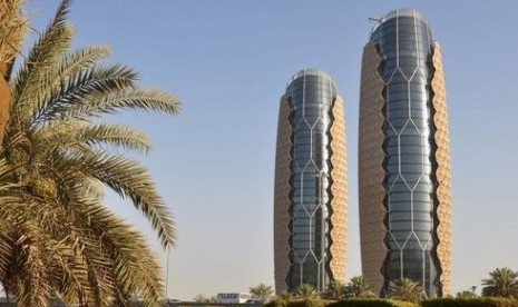 Abu Dhabi Tangguhkan Pembayaran Layanan Utang. Al-Bahr Towers di Abu Dhabi, Uni Emirat Arab. 