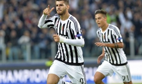 Alvaro Morata meluapkan kegembiraan usai menjebol gawang Sevilla dalam penyisihan Grup D Liga Champions dalam pertandingan yang digelar di Juventus Stadium, Turin, Italia, 30 September waktu setempat. 