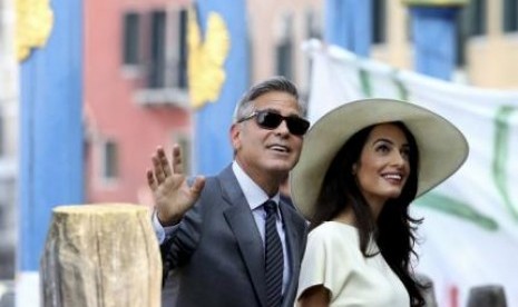 Amal Alamuddin dan suaminya, George Clooney