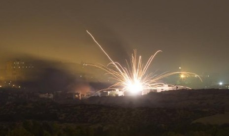 An Israeli rocket is fired into the northern Gaza Strip July 17, 2014. 