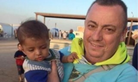 An undated family handout photo of British aid worker Alan Henning taken at a refugee camp on the Turkish-Syria border.